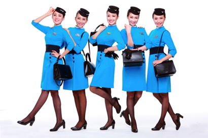 Sweet stewardesses at Xiamen Airlines, Xiamen Air uniforms. Courtesy of Xiamen Air